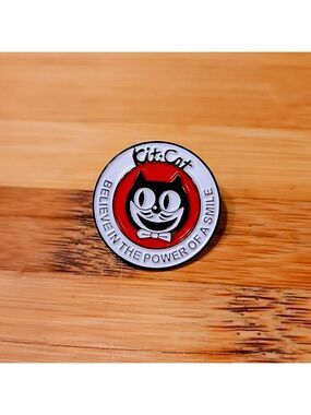 Kit-Cat Klock enamel pin